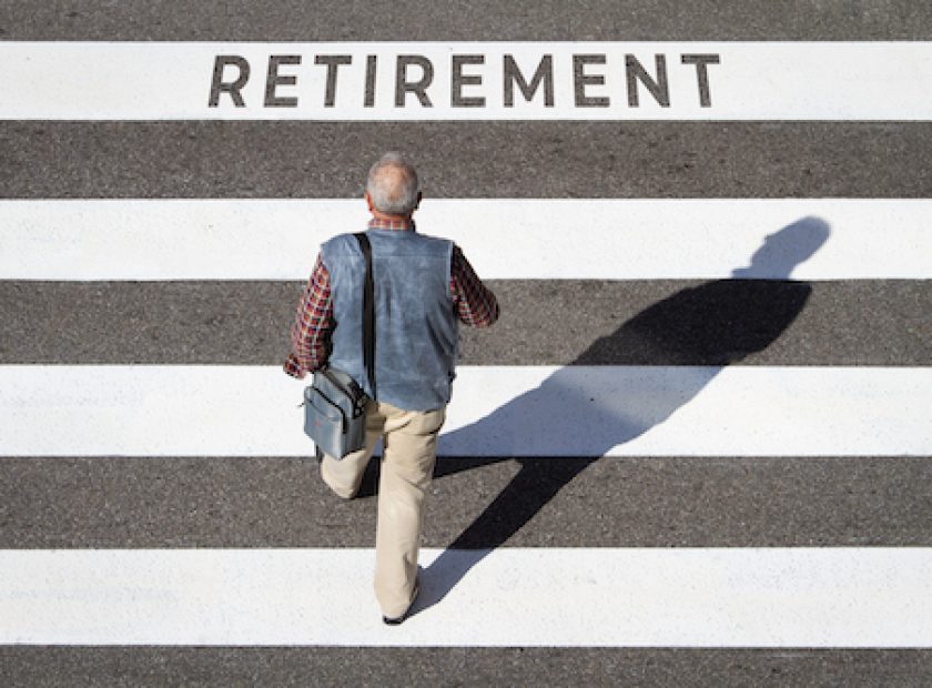 Retirement concept. Scene of a senior man walking in a cebra crossing towards retirement text. Top view